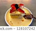 Tres Leches Cake on a small plate 128107242