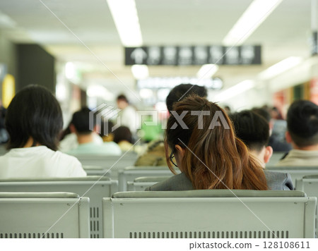 People waiting in the arrival lobby at Chubu Centrair International Airport People waiting in the arrival lobby at Chubu Centrair International Airport 128108611