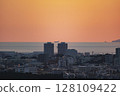 Scene of an airplane taking off in the evening 128109422