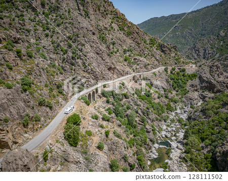 Camping Caravan driving through Canyon de la Ruda road Corsica down the pass monte Cino 128111502