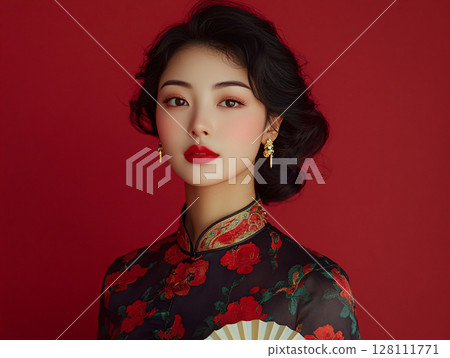 Chinese woman in traditional cheongsam qipao dress holding fan on isolated red background. AI Generated. Chinese woman in traditional cheongsam qipao dress holding fan on isolated red background. AI Generated. 128111771