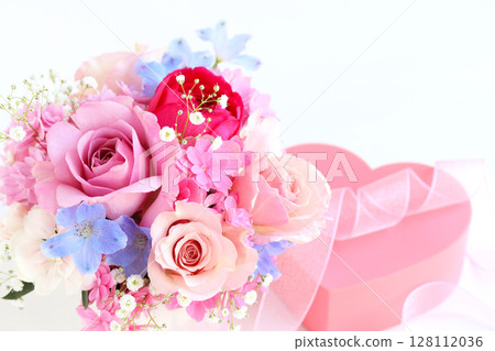 Rose and delphinium arrangement 128112036