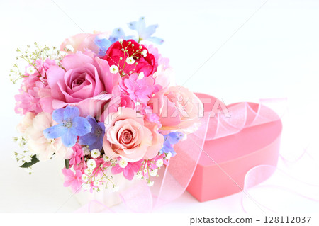 Rose and delphinium arrangement Rose and delphinium arrangement 128112037