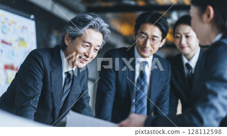 Businessmen having a meeting in the office Business scene Businessmen having a meeting in the office Business scene 128112598