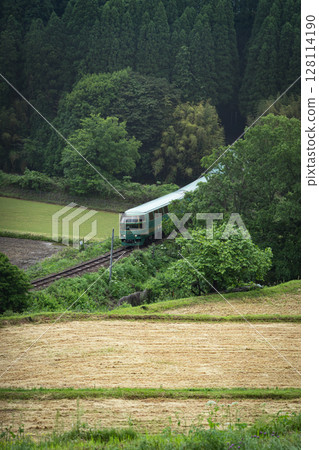 Yufuin no Mori, a tourist express train running through the countryside 128114190