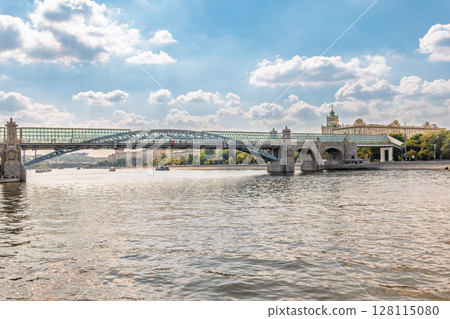 View of the Moscow river embankment, Pushkinsky bridge and cruise ships at sunset. 128115080