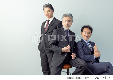 Cool middle-aged male business person 128115107