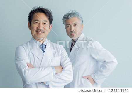 Middle-aged man wearing a white coat 128115121