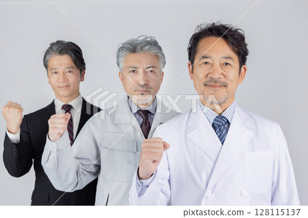 Middle-aged men of various professions making fist pumps 128115137