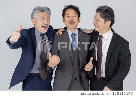 A middle-aged male business person in high spirits A middle-aged male business person in high spirits 128115147