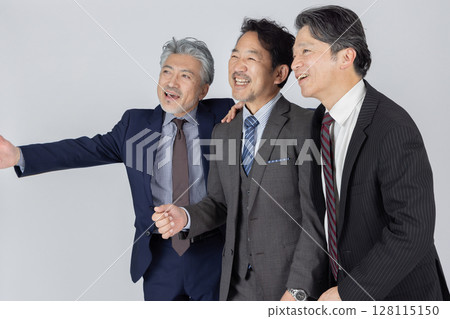 A middle-aged male business person in high spirits 128115150