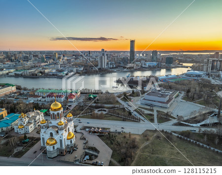Early spring or autumn Yekaterinburg and Temple on Blood in clear sunset. Aerial view of Yekaterinburg, Russia. Translation of the text on the temple: Honest to the Lord is the death of His saints. 128115215