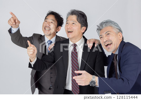 A middle-aged male business person in high spirits 128115444