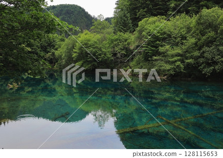 Mysterious blue lake Mysterious blue lake 128115653