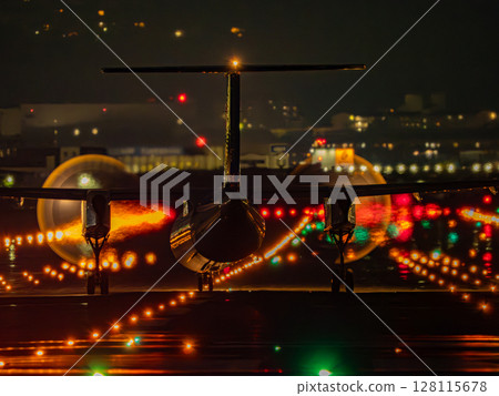 Jet plane taking off at dusk 128115678