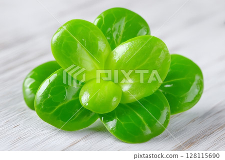 A close-up view of microgreen broccoli as it grows on a linen mat 128115690