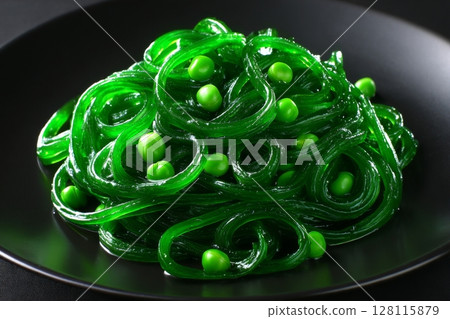 A close-up view of a nutritious vegan salad consisting of peas, microgreen, sprouts, and sprouted beans, with copy space available 128115879