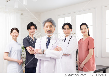 A team of medical workers working in a hospital A team of medical workers working in a hospital 128115901