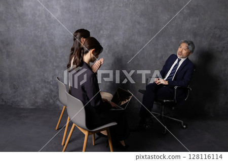 CEO of a major company receiving media interviews CEO of a major company receiving media interviews 128116114