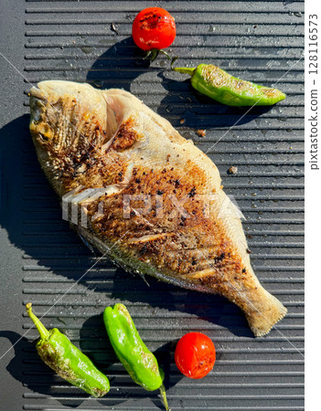 freshly grilled dorada 128116573