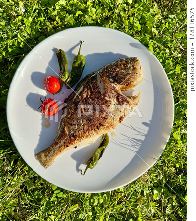 freshly grilled dorada 128116575