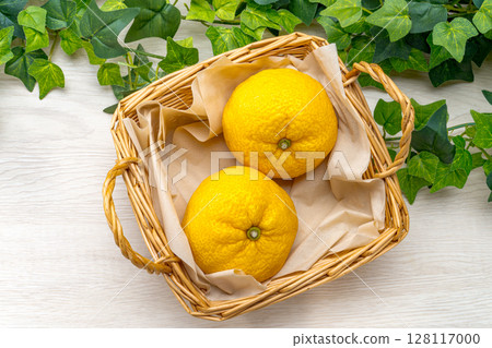 fresh yuzu in a basket 128117000