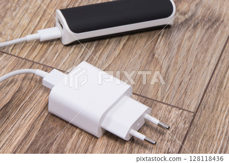 Charger and external powerbank to charge battery of smartphone or other device 128118436