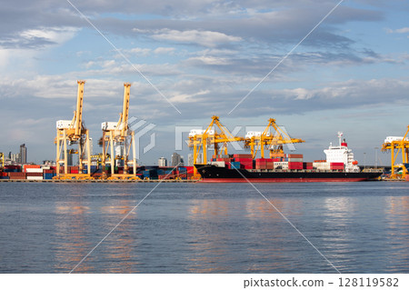 Cargo ship at port in Bangkok city, Thailand. Cargo ship at port in Bangkok city, Thailand. 128119582