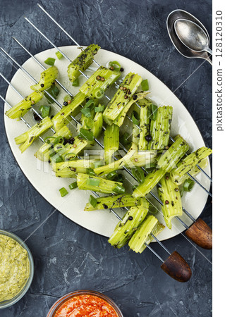 Vegan barbecue, celery skewers. 128120310