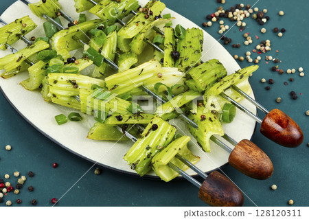diet eating, celery on skewers. diet eating, celery on skewers. 128120311