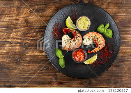 Roasted large lobster tail. 128120317