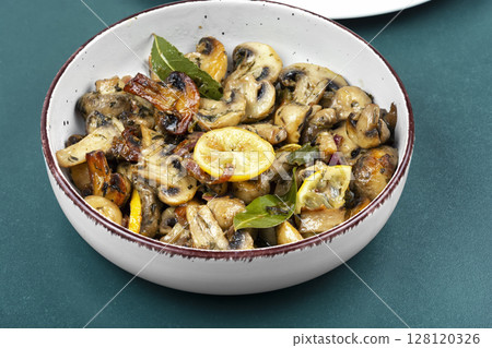 Fried mushrooms with sauce. 128120326