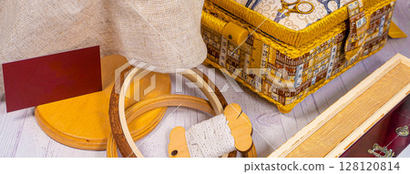 Accessories for hobby. Hoop snaps, scissors, threads, needles and scissors. Vintage tools for embroidery and knitting 128120814