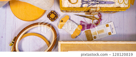 Accessories for hobby. Hoop snaps, scissors, threads, needles and scissors. Vintage tools for embroidery and knitting 128120819