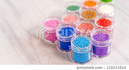 Colorful glass beads. Variety of shapes and colors to make a bead necklace or a string of beads for women Colorful glass beads. Variety of shapes and colors to make a bead necklace or a string of beads for women 128121014