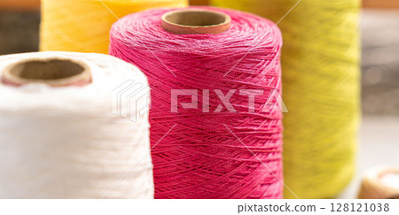 Threads in reels. Colored bobbins for embroidery knitting hobby accessories creativity. 128121038
