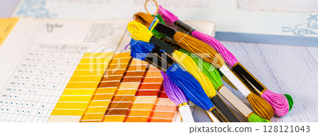Palette of thread colors. Threads for embroidery knitting 128121043