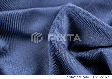 Rich blue fabric macro background. 128122074