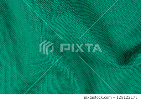 Close-Up of Abstract Green Emerald Cotton Textile Surface Top View Close-Up of Abstract Green Emerald Cotton Textile Surface Top View 128122173