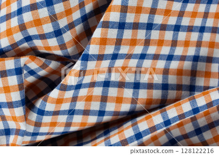 Macro texture of a fabric consisting of one hundred percent cotton. 128122216