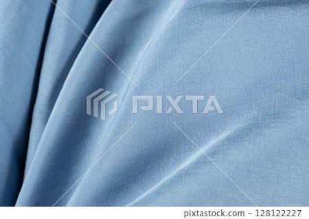 Abstract Blue Fabric Background Space for Text Abstract Blue Fabric Background Space for Text 128122227