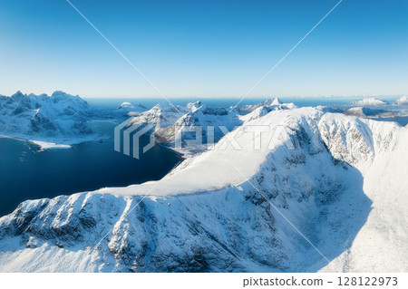 Aerial view on the Lofoten Islands, Norway. Panoramic view. Natural winter landscape from air. 128122973