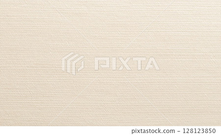 A cream beige coarsely woven texture that makes the most of the fiber of linen fabric A cream beige coarsely woven texture that makes the most of the fiber of linen fabric 128123850