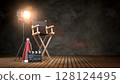 Empty director chair illuminated by spotlight. Film production and movie backstage. 3d illustration 128124495