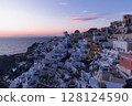 Santorini - The city of Oia and the sea in the distance 128124590