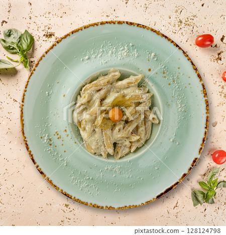 Delicious penne pasta with cheese sauce 128124798