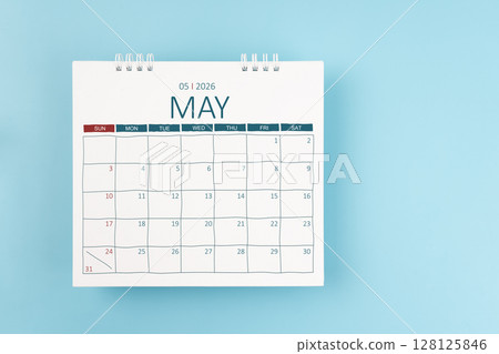 May 2026 Monthly desk calendar for 2026 year on blue color background. Flat lay. May 2026 Monthly desk calendar for 2026 year on blue color background. Flat lay. 128125846