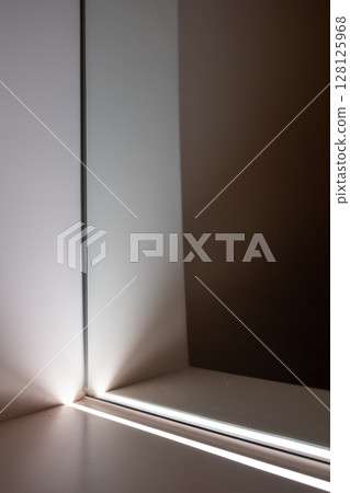 Integrated linear lighting on the cabinet, in front of the mirror Integrated linear lighting on the cabinet, in front of the mirror 128125968