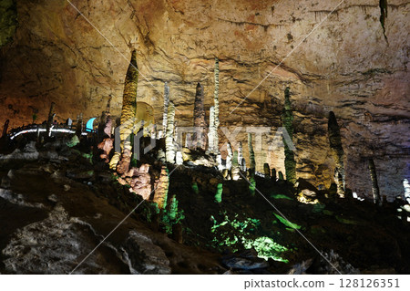 Zhangjiajie, Hunan Province, China - March 12, 2025: The beautiful interior of the Huanglong Cave in Zhangjiajie.ean landscapes within the cave. 128126351