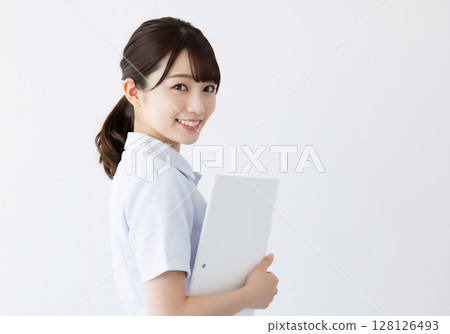 Smiling and friendly portrait of a nurse Smiling and friendly portrait of a nurse 128126493